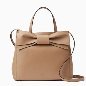 Kate Spade cream satchel with dust cover bag